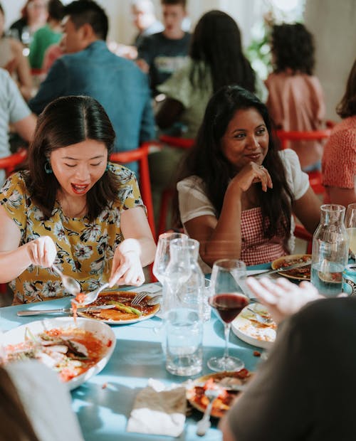 Image of a group of people enjoying a meal at Bureau restaurant