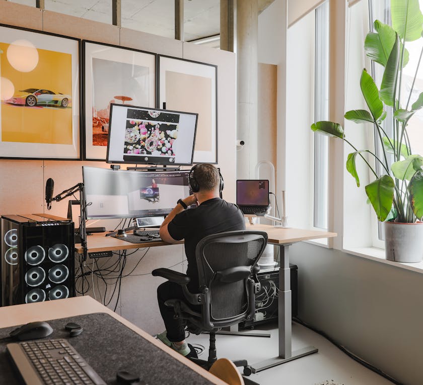 Image of a man working on video editing