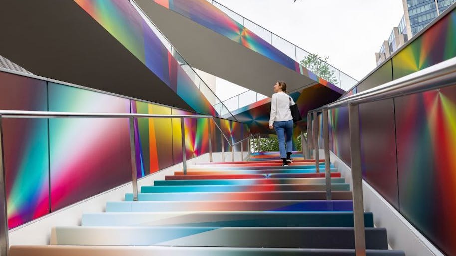 woman walking up stairs