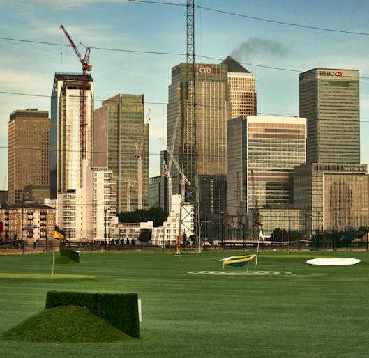 Driving range in London, with views of Canary Wharf