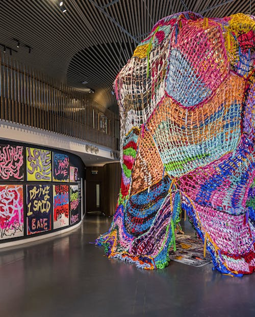 Image of a large art installation made out of knitted wool