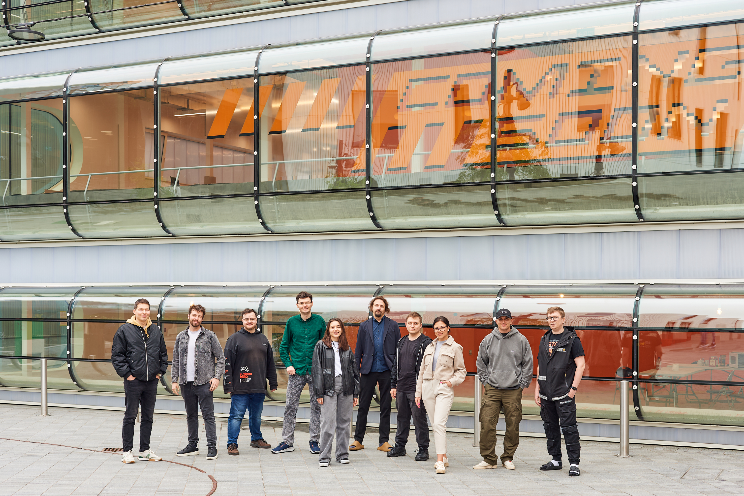 Flipper team outside of Design District building B1