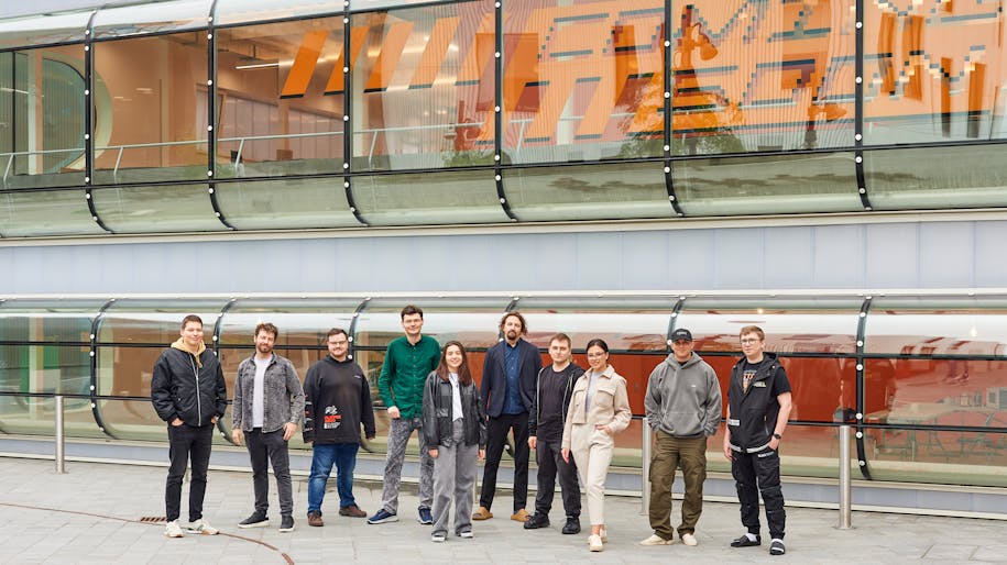 Flipper team outside of Design District building B1