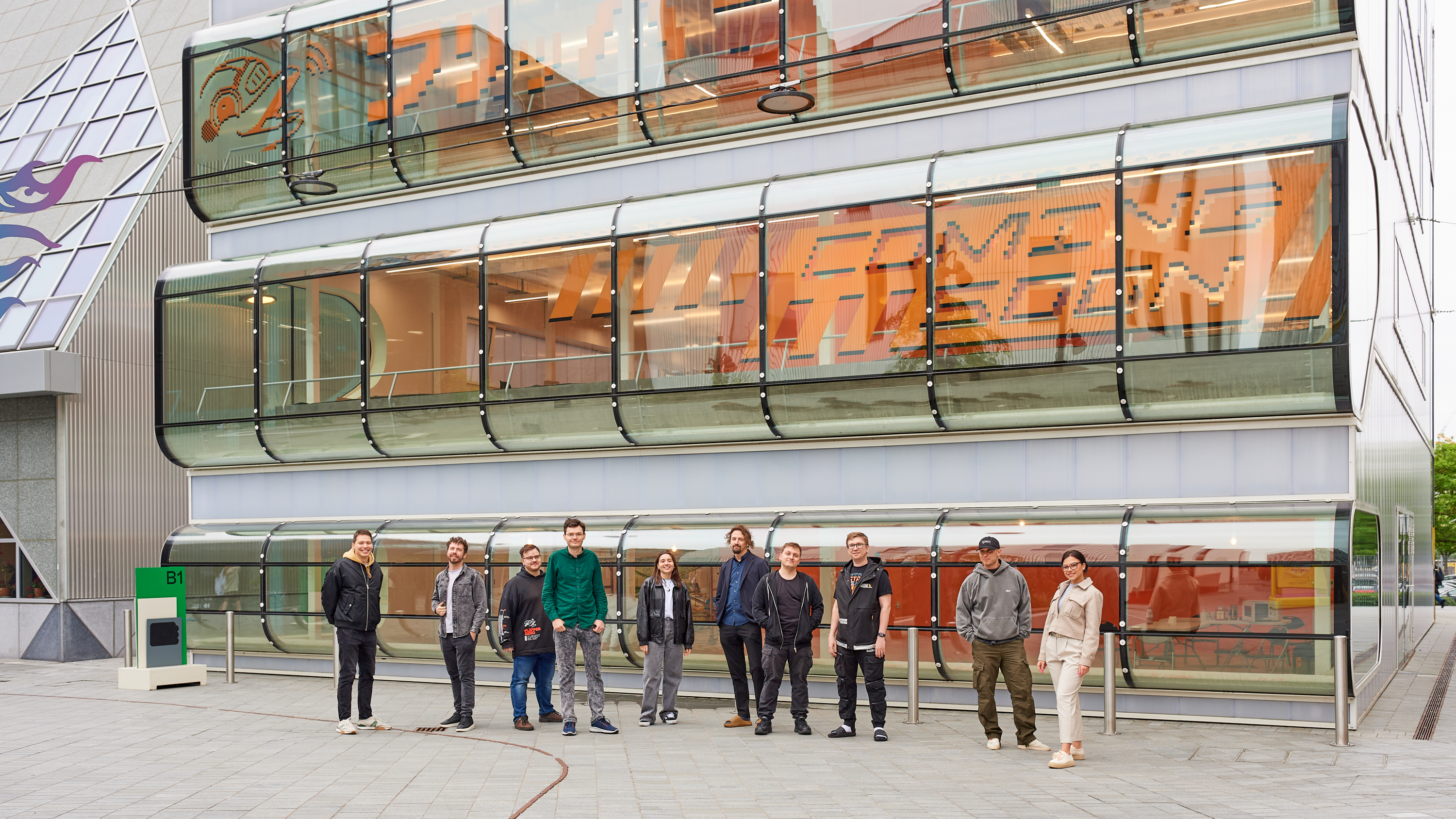 Flipper team outside of Design District building B1