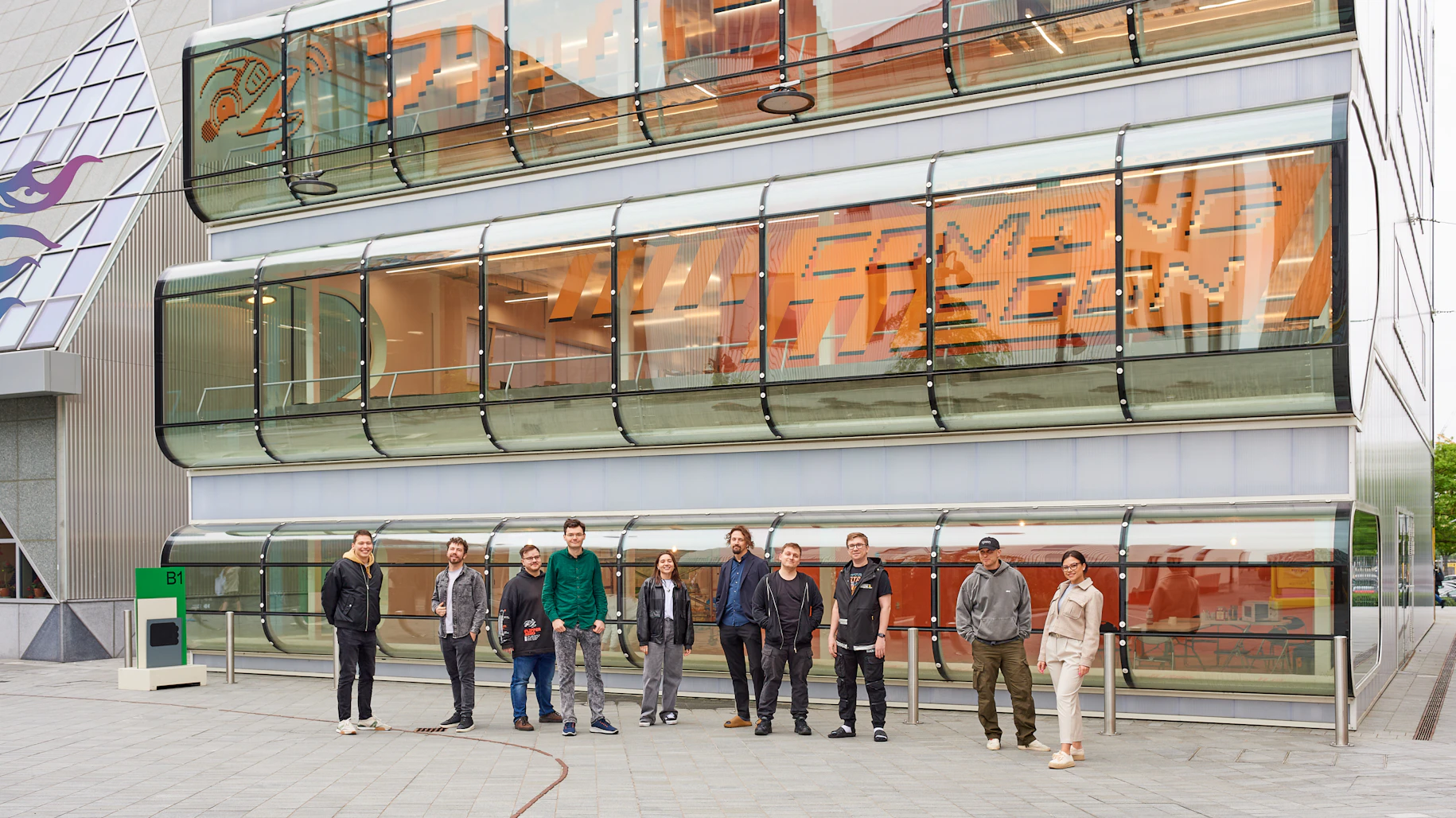 Flipper team outside of Design District building B1