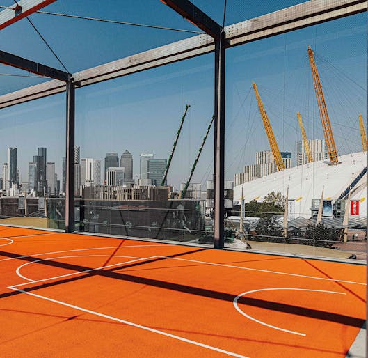 Rooftop basketball with views of Canary Wharf