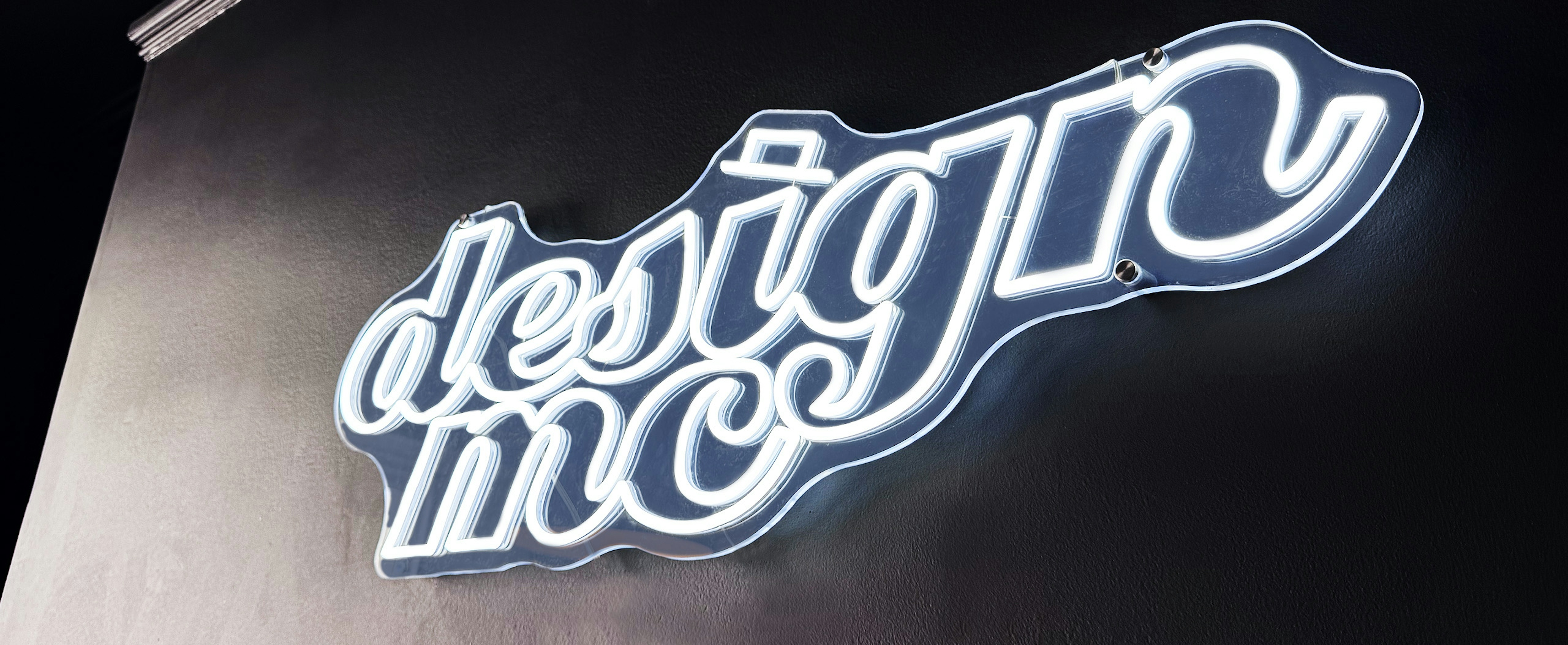 Designmc logo studio neon sign