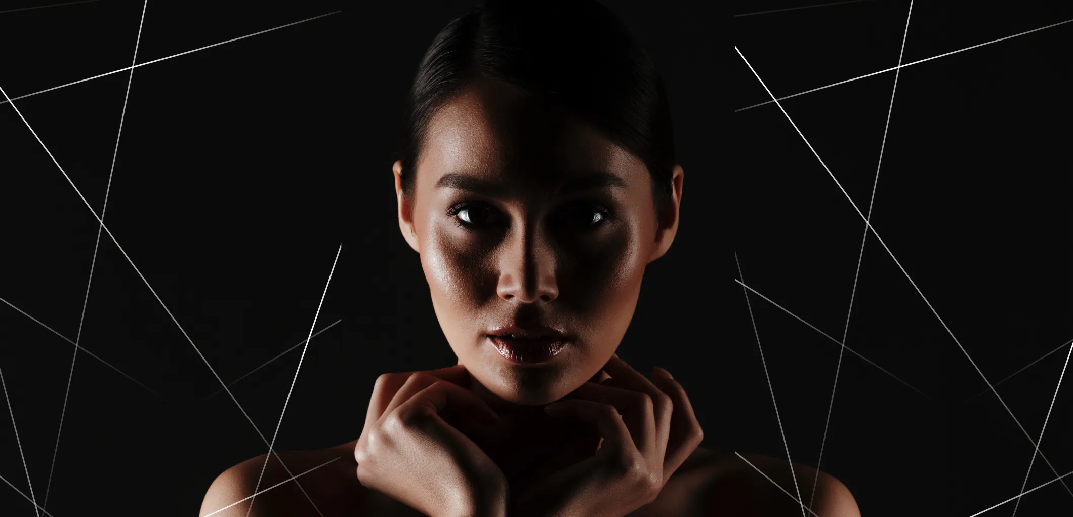 a chic woman headshot with a graphic design background