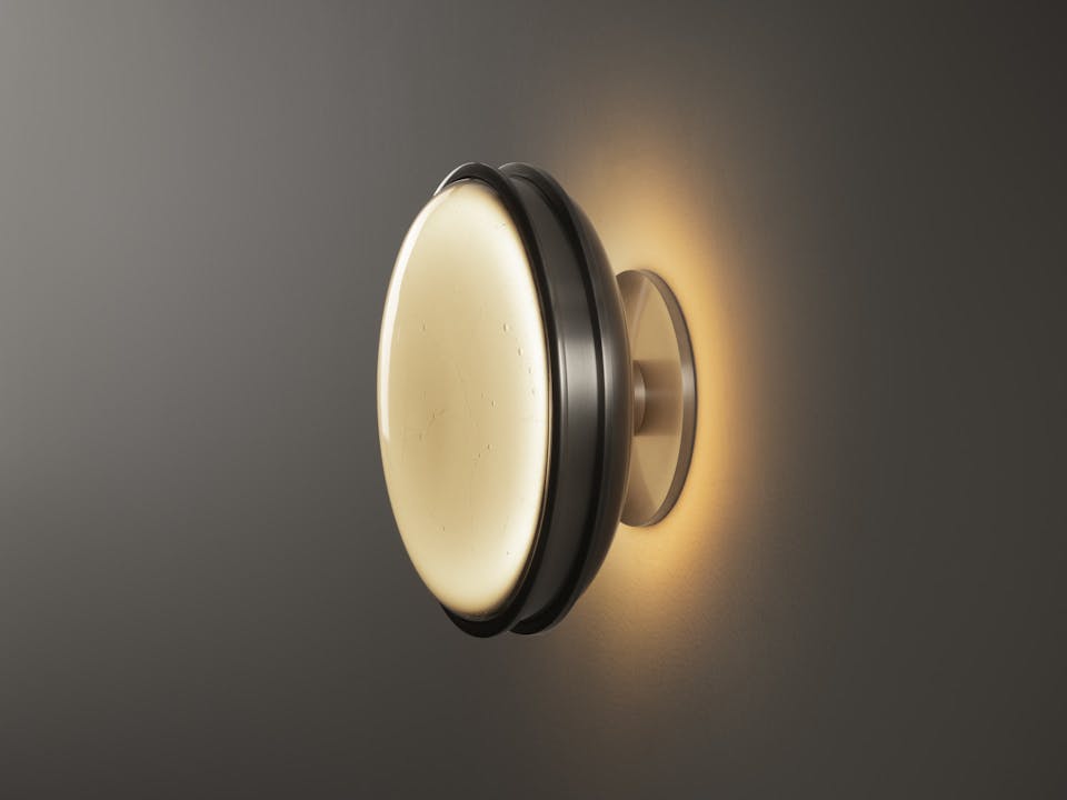 de sousa hughes aither monos button sconce aged nickle side angle dark background