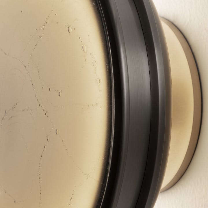 de sousa hughes aither monos button sconce aged nickle side angle detail light on