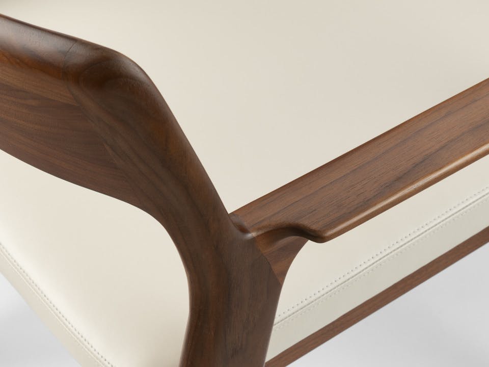 de sousa hughes caste buell dining arm chair walnut natural top angle detail