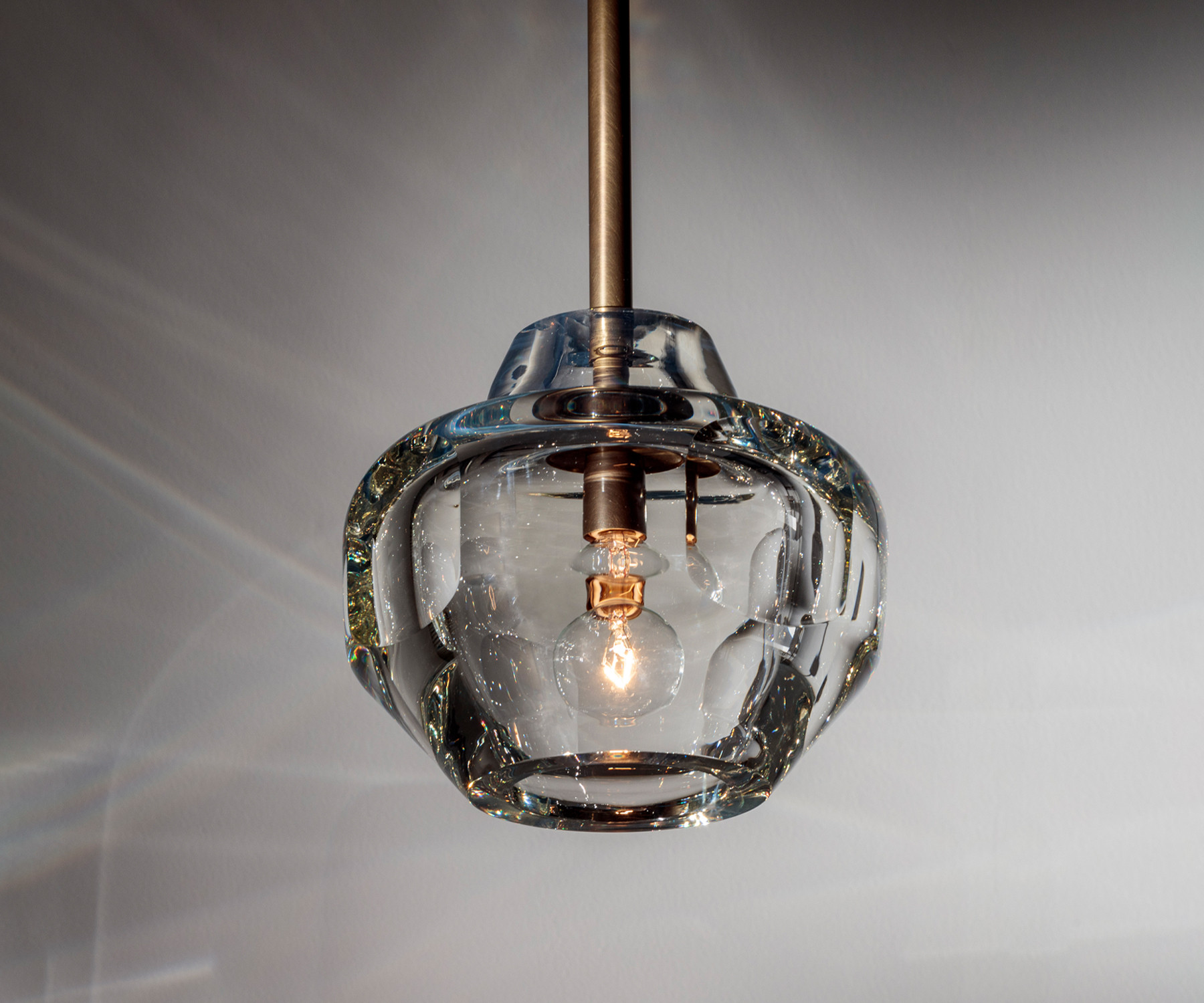 de sousa hughes alison berger beacon pendant dark background