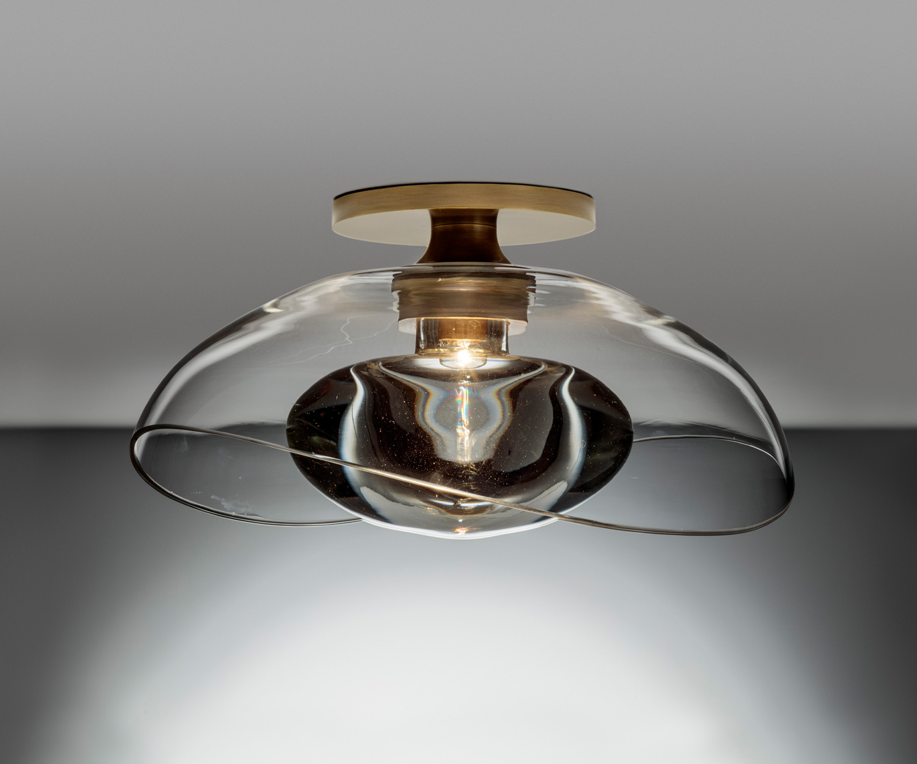 de sousa hughes alison berger beckon sconce ceiling mount detail dark background