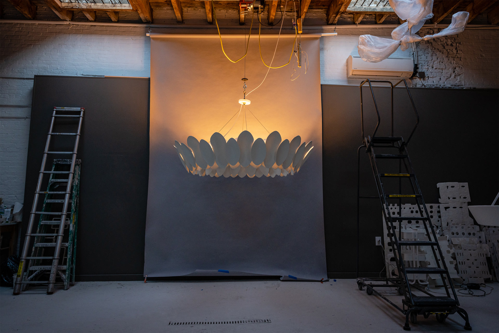 de sousa hughes stephen antonson Petal Chandelier illuminated install