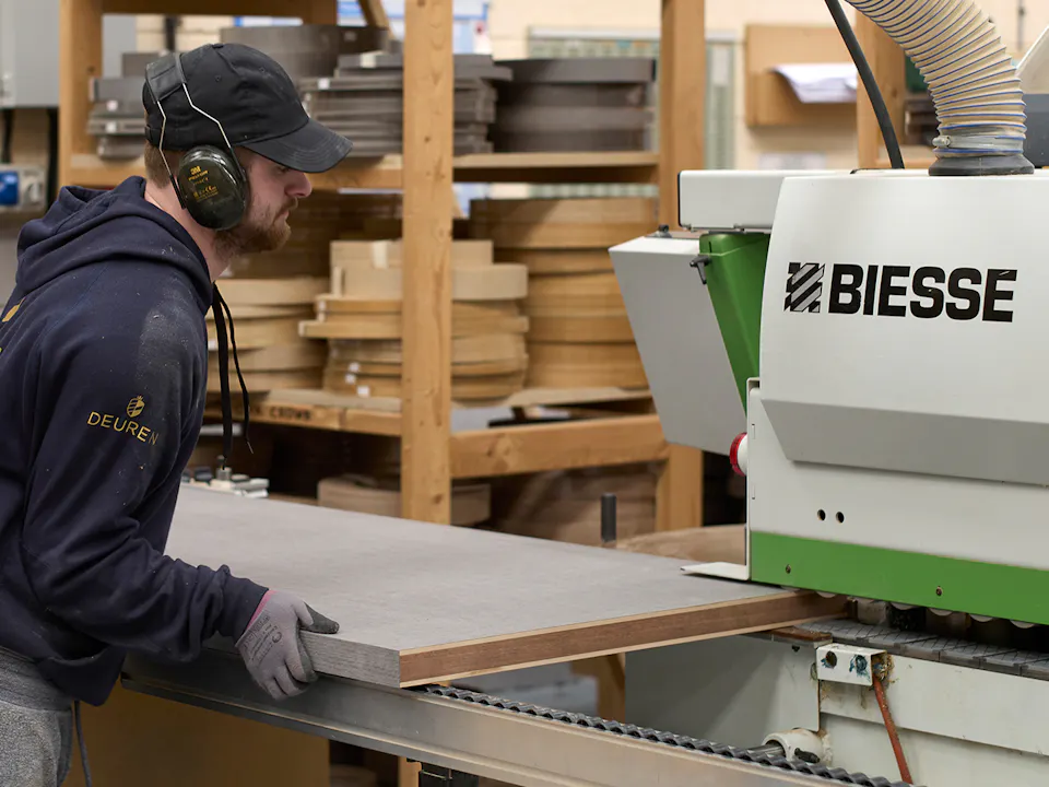 A Deuren door being crafted in the factory