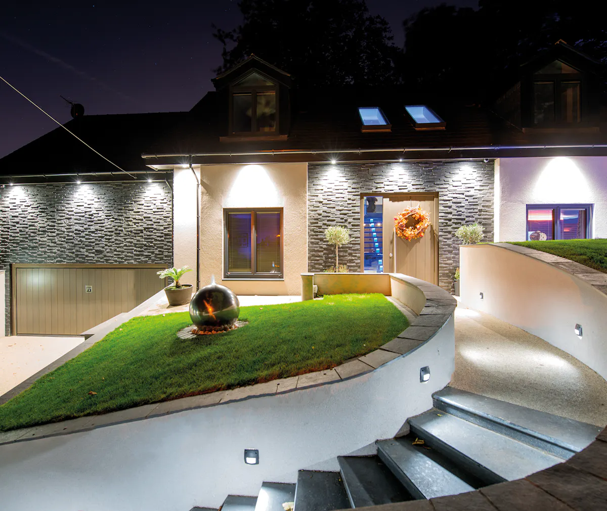 Illuminated house at night.