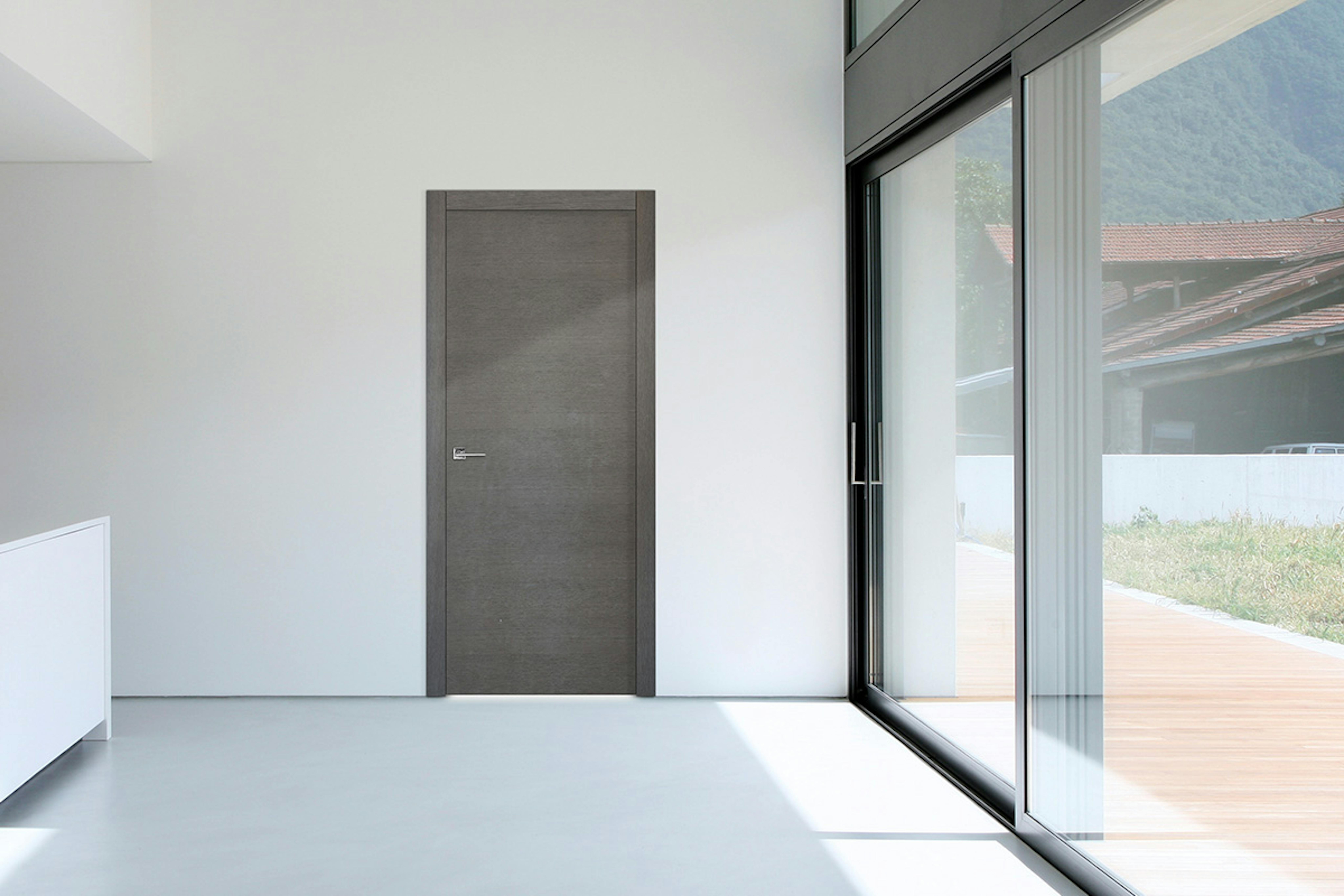 Ultra modern home with a contemporary pre-hung door set in grey by Deuren