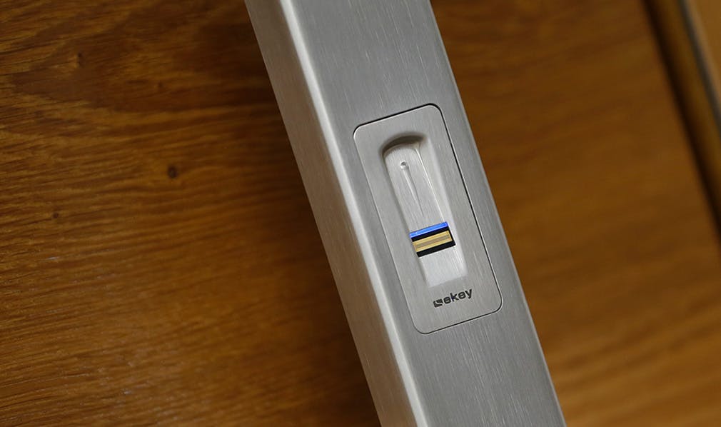 Close up of thumb lock door handle
