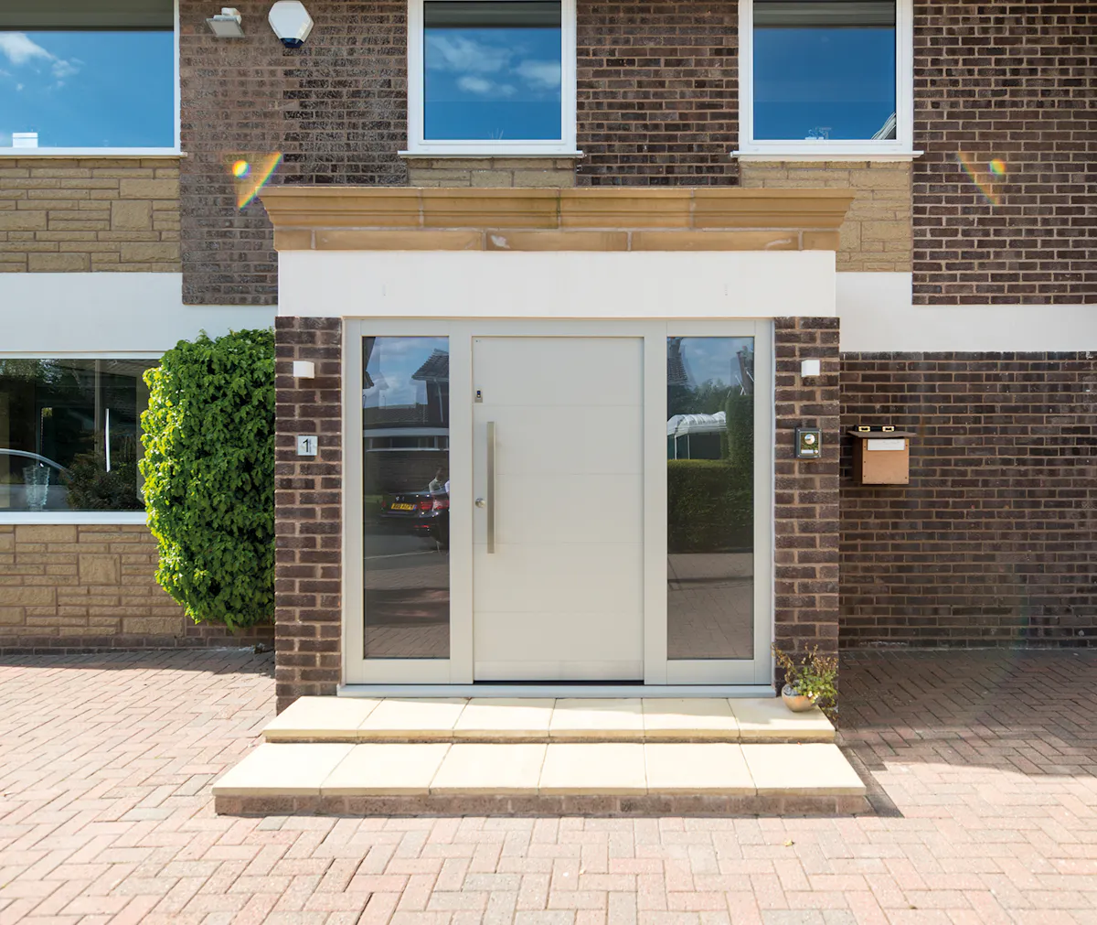 Brick house with a white front door.