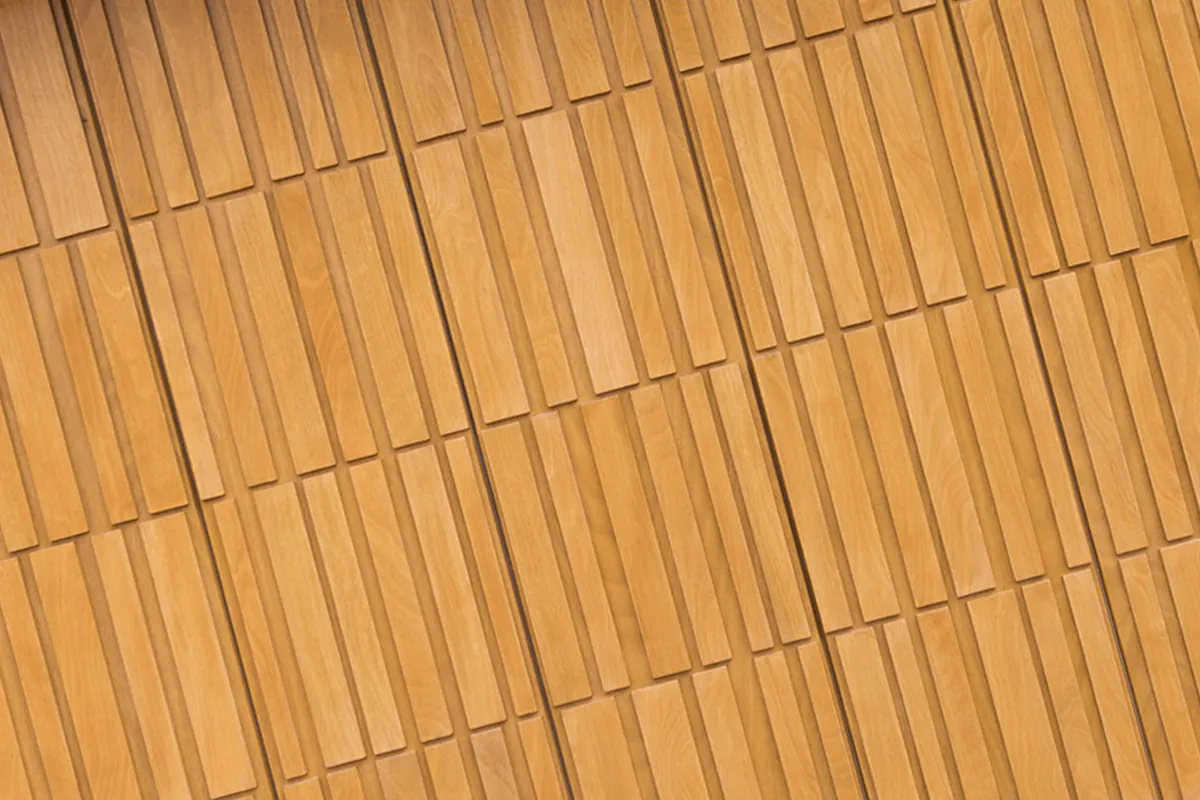 Close-up of Deuren's modern garage door design, Tavole, finished in honey oak.