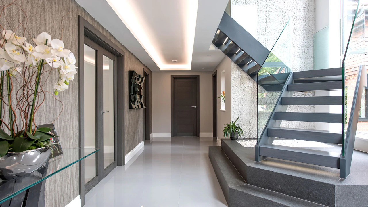 The interior of a modern home with dark internal doors.