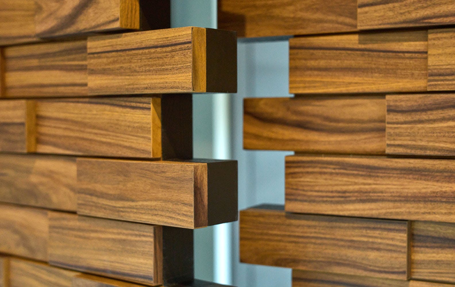 Close up of bespoke stacked timber-block door leaf cross section.