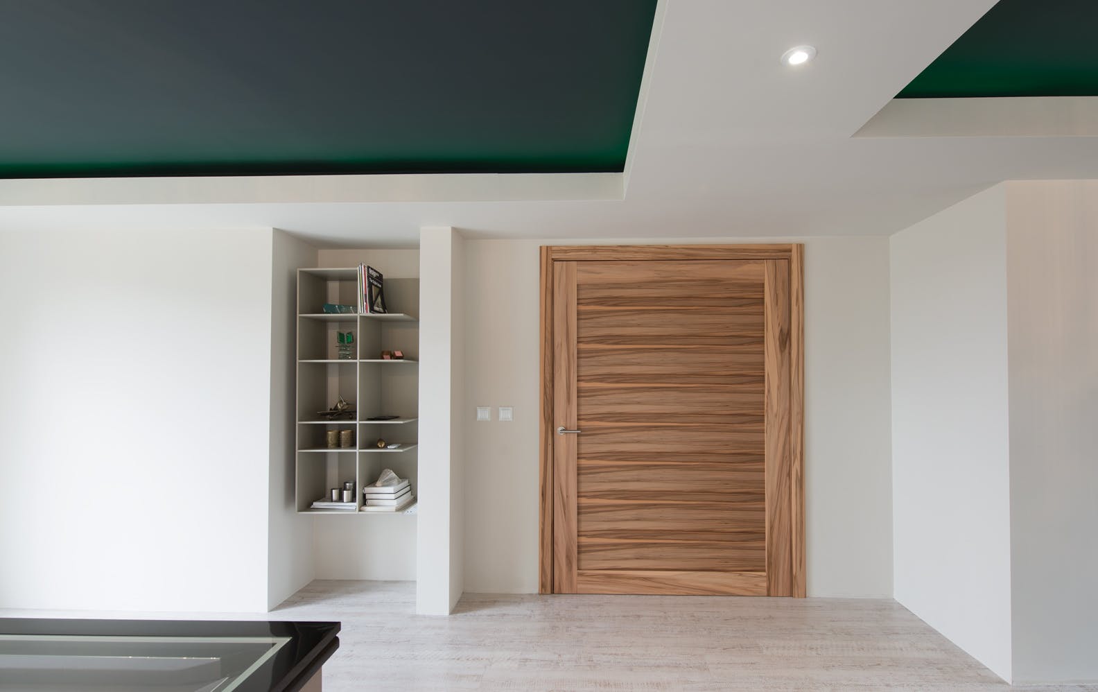 A light and airy games room featuring an extra wide door set in Trem H, satin walnut - demonstrating Deuren's made-to-measure door set capabilities.