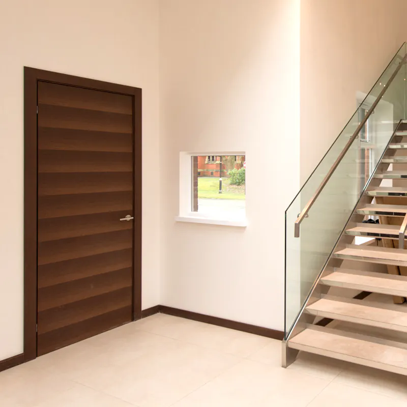 Using dark timber to create beautiful contrast with light walls