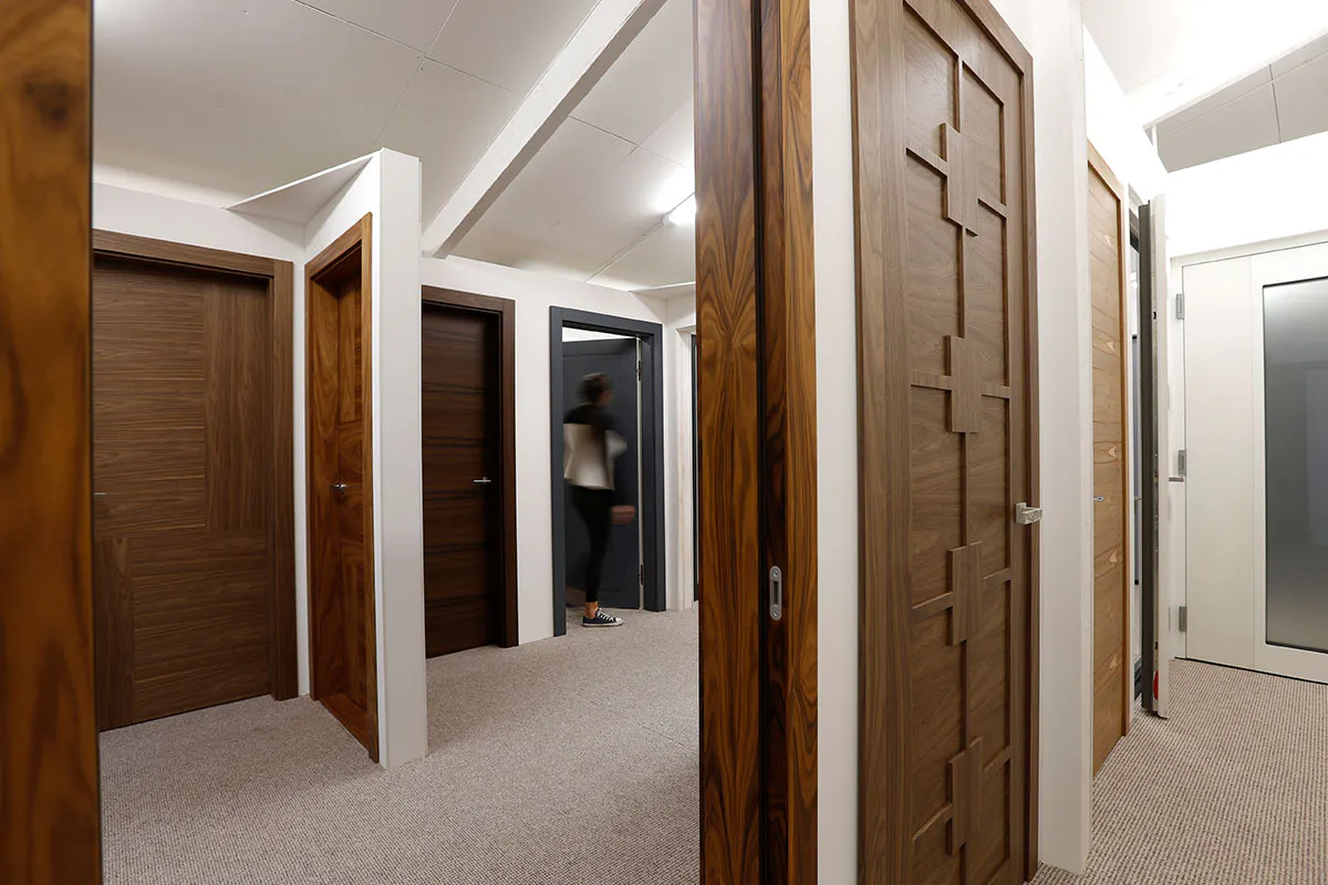 Deuren showroom with someone looking at the luxury doors