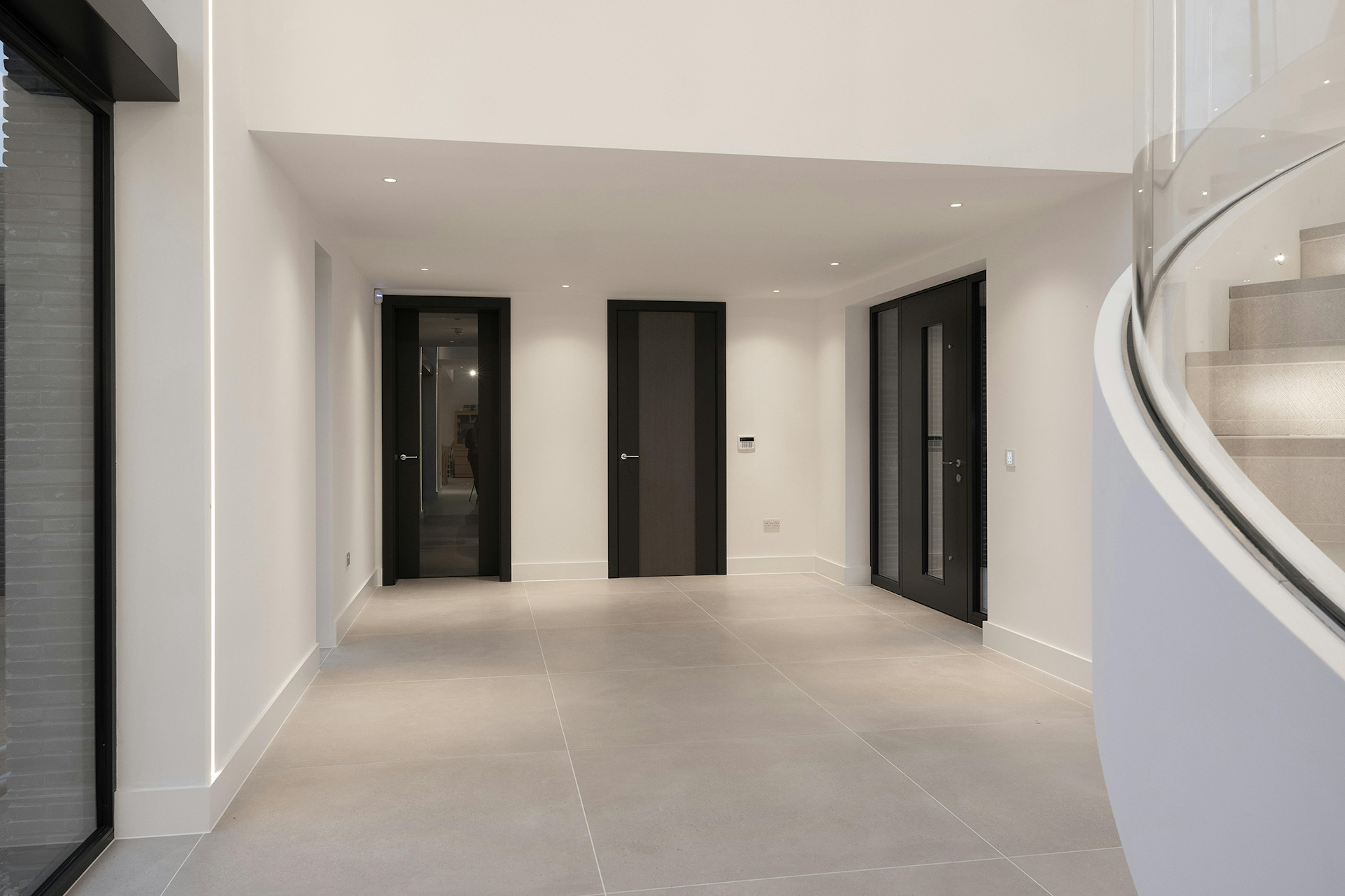 Deuren internal doors in Linea, and Deuren external door in Vista.