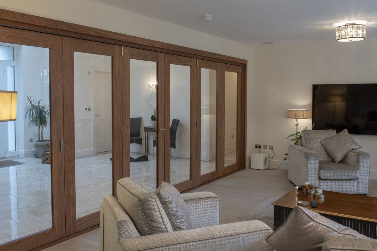 Made-to-measure, pre-hung bi-fold door set with 6 door leaves- Gio Glass, natural oak by Deuren