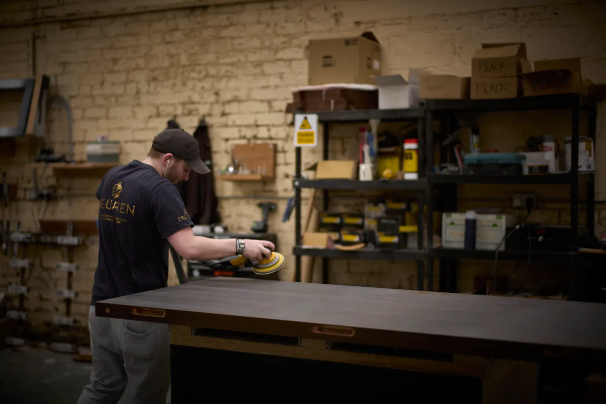 Workbench joiner working in Deuren's British factory.