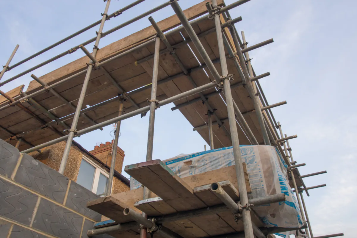 Scaffolding surrounding and extention build