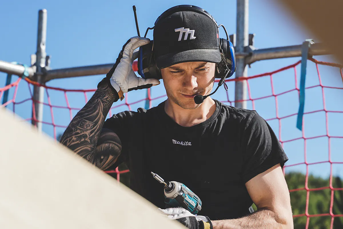 Builder working on construction site.