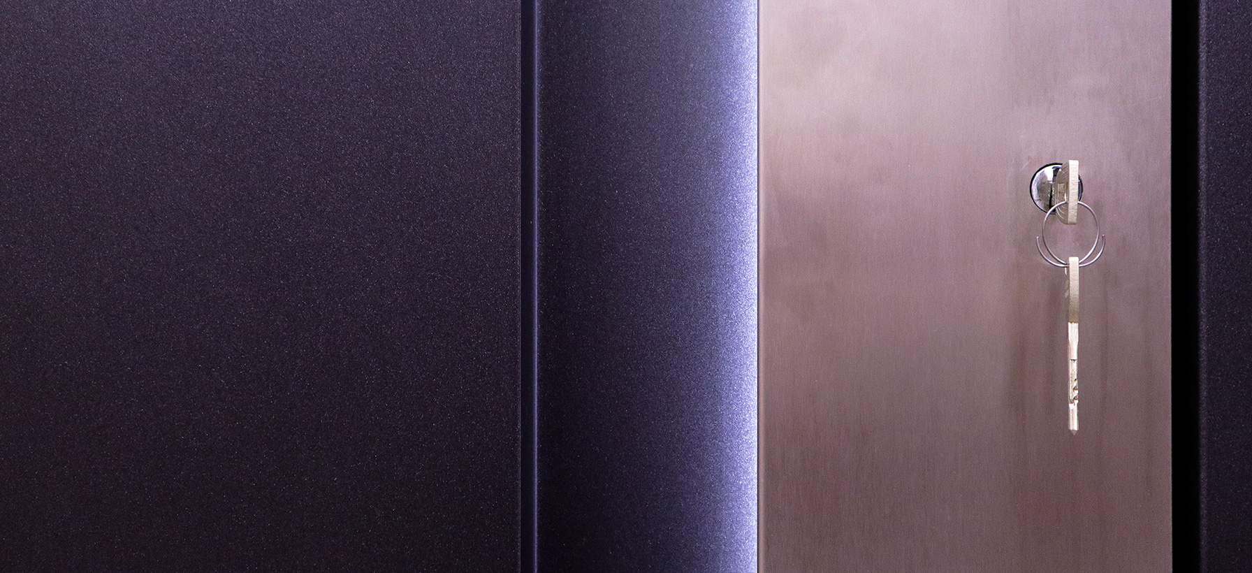 Close up of door with key in lock