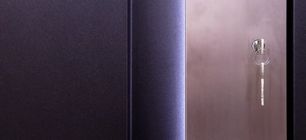 Close up of door with key in lock