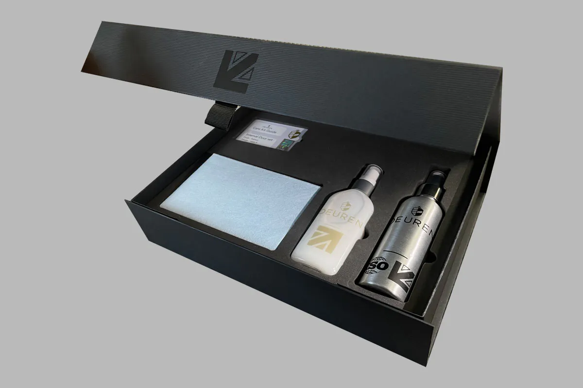 Deuren care kit box open with a view of care products included.