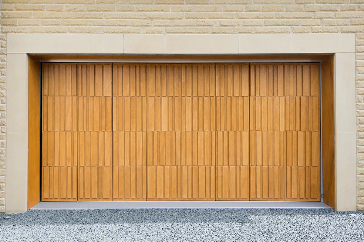 bespoke side sectional garage door by Deuren in Tavole in Honey Oak