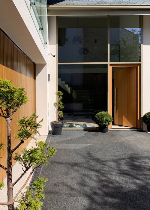matching modern oak front and garage door 