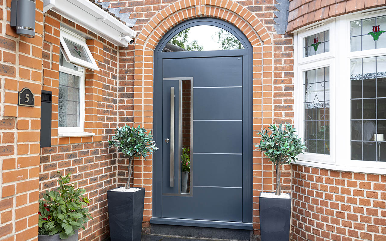 Light, Privacy, Security - A Modern Arched Entrance