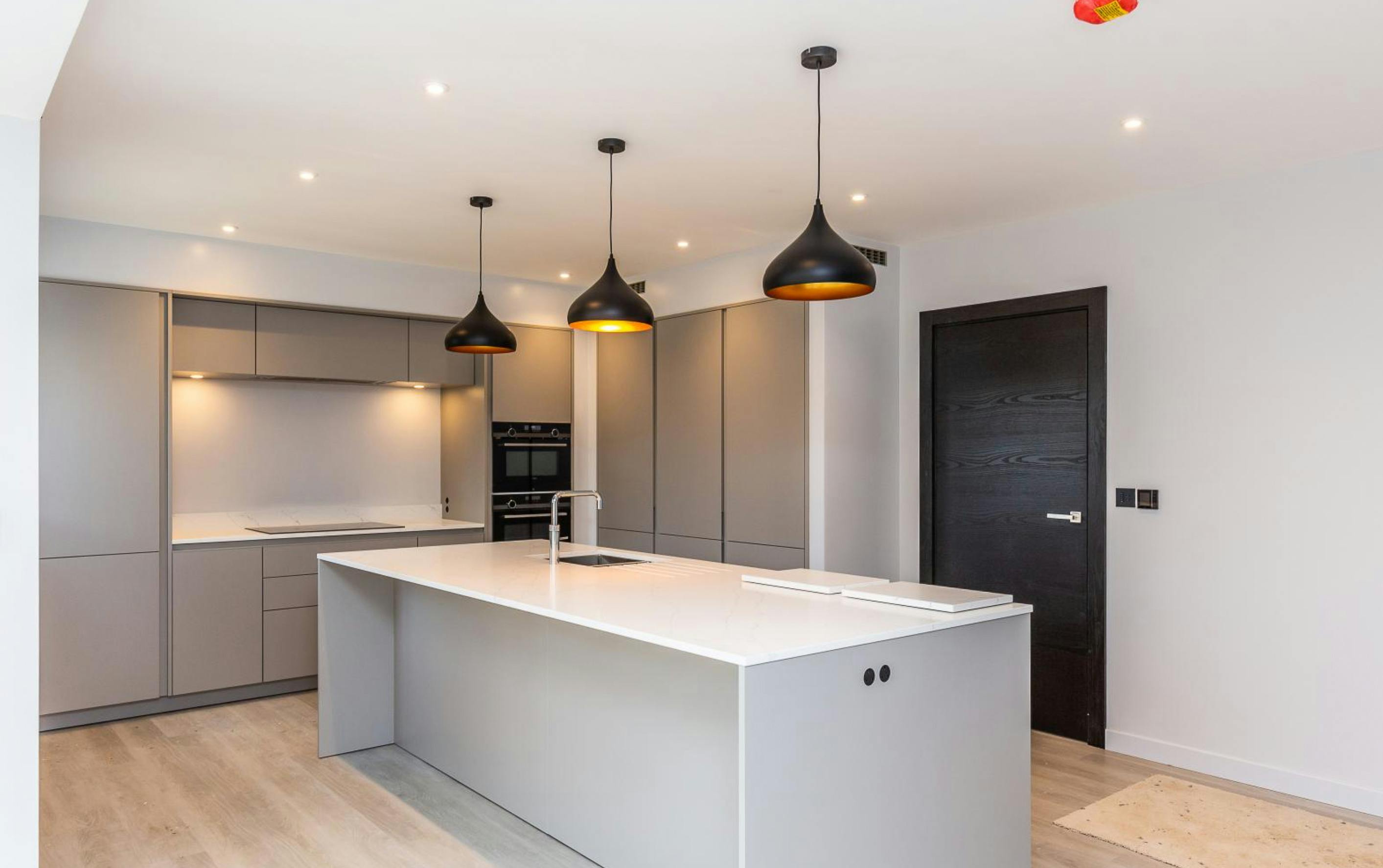 Beautiful black doors for a breathtaking gated development
