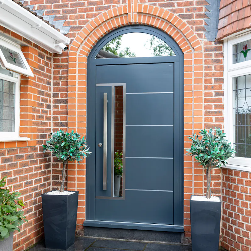 Light, Privacy, Security - A Modern Arched Entrance