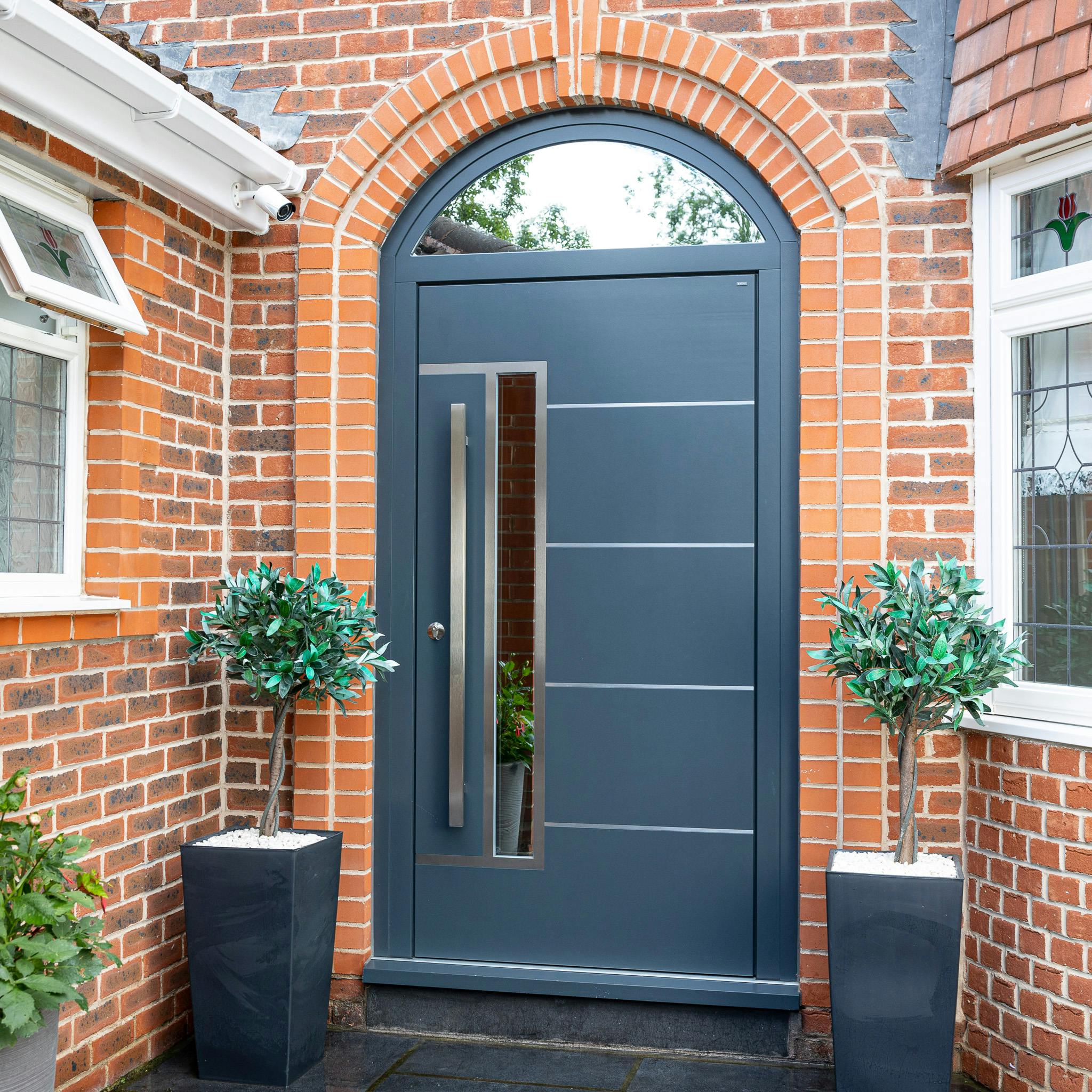 Light, Privacy, Security - A Modern Arched Entrance