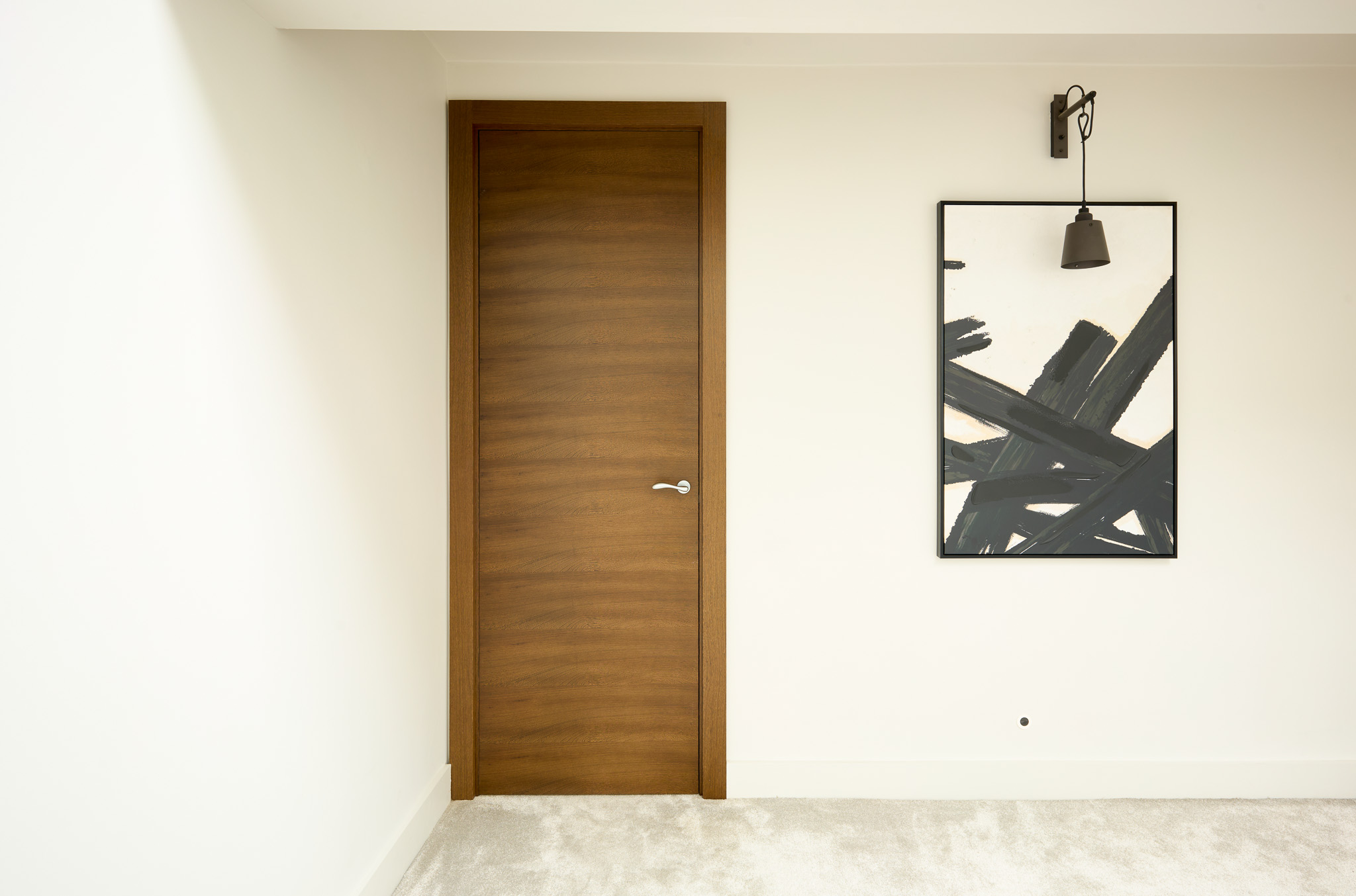A sleek and stylish door solution perfectly complementing their new-build’s unique aesthetic.