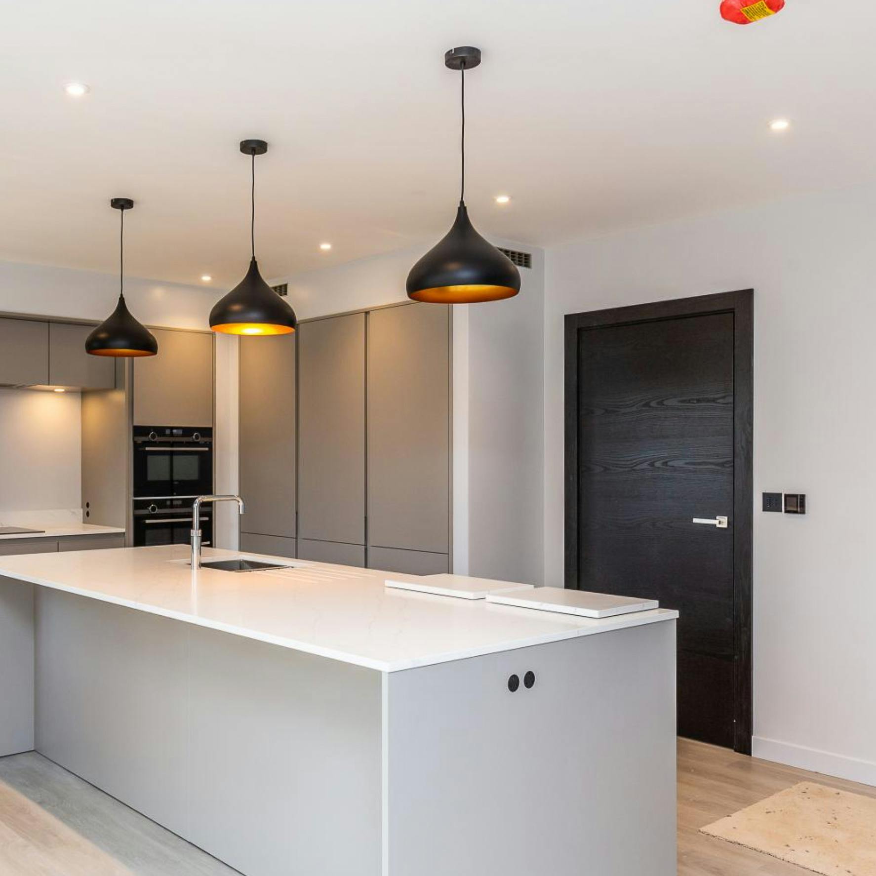 Beautiful black doors for a breathtaking gated development