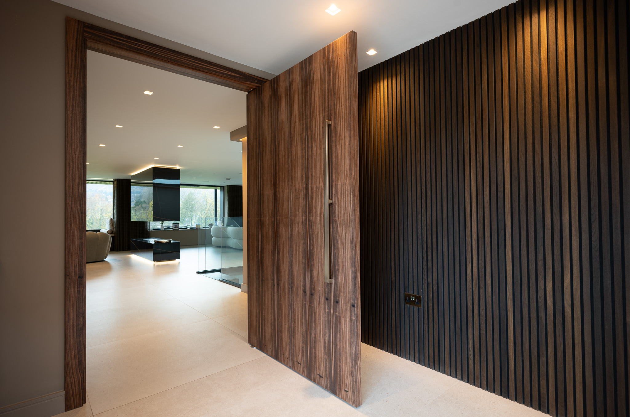 Separating a entranceway using a statement pivot door