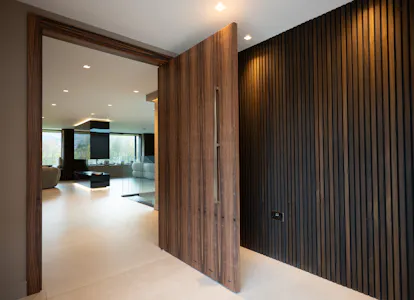 Separating a entranceway using a statement pivot door