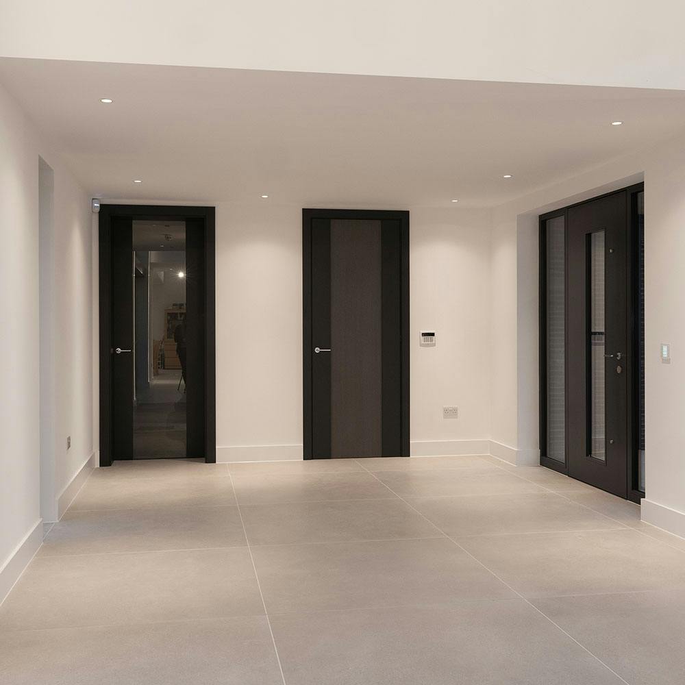 Maximising light flow with extra height doors