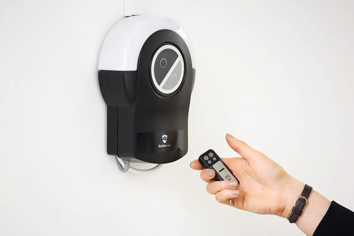 Automated garage system and remote control.