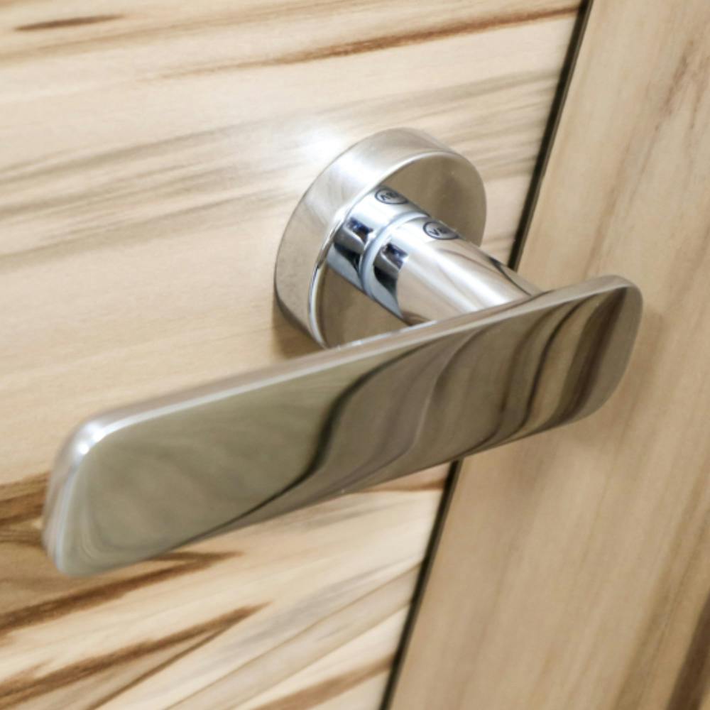 metal handle on bespoke wooden door